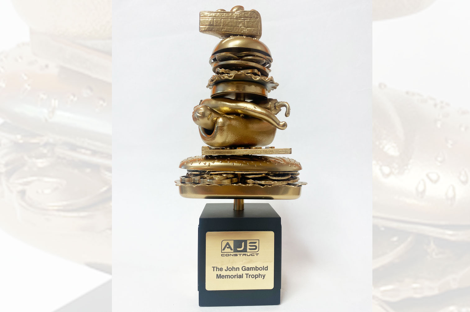 Bespoke gold food eating competition trophy.