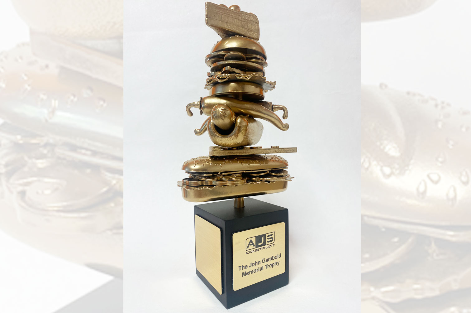 Bespoke gold food eating competition trophy.