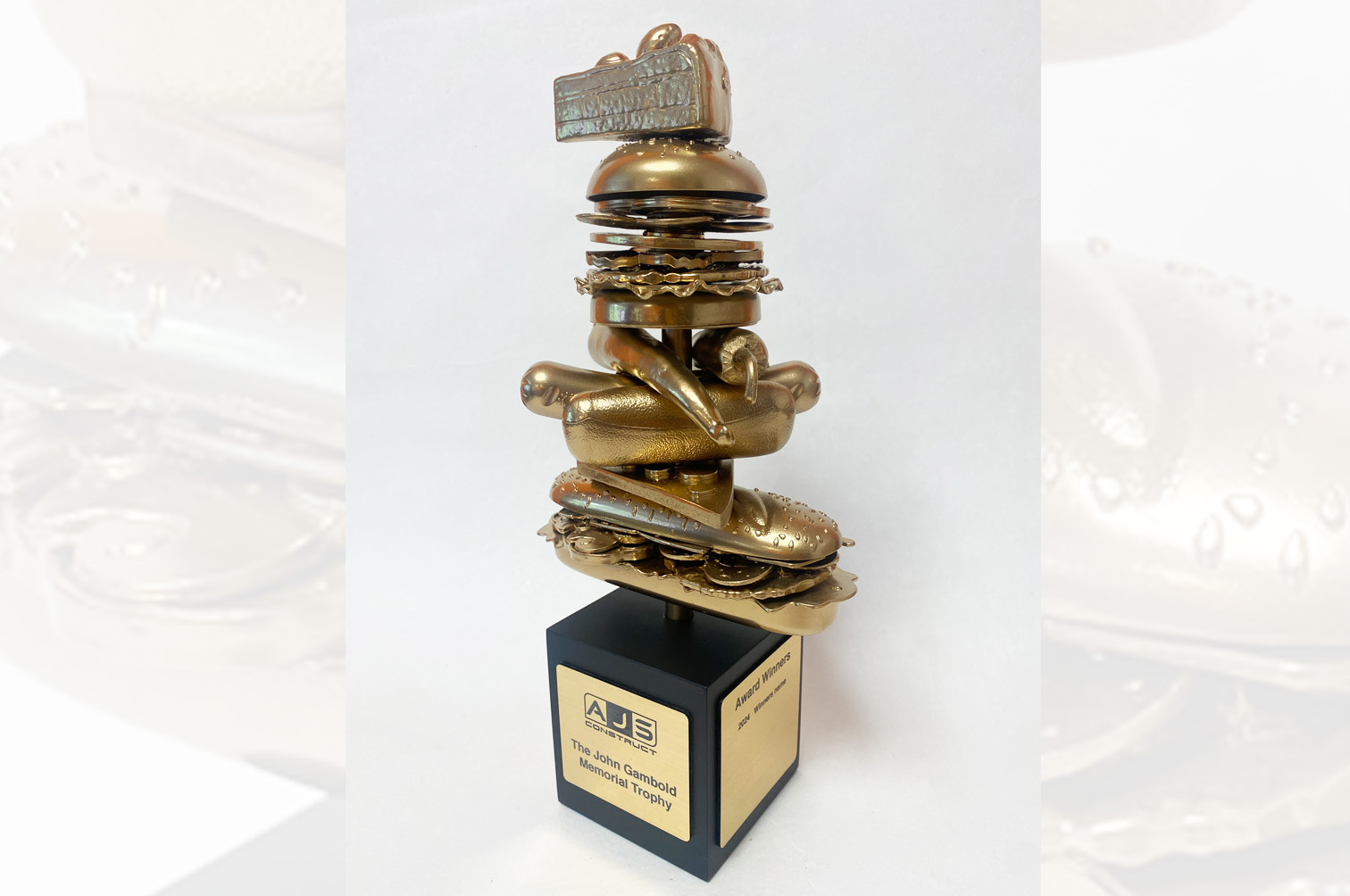 Bespoke gold food eating competition trophy.